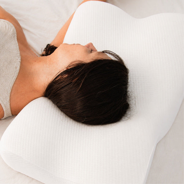 Oreiller cervical pour dormeur sur le ventre : existe-t-il une solution ?