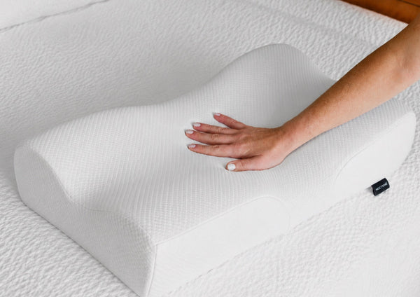 Coussin chauffant vs oreiller cervical
